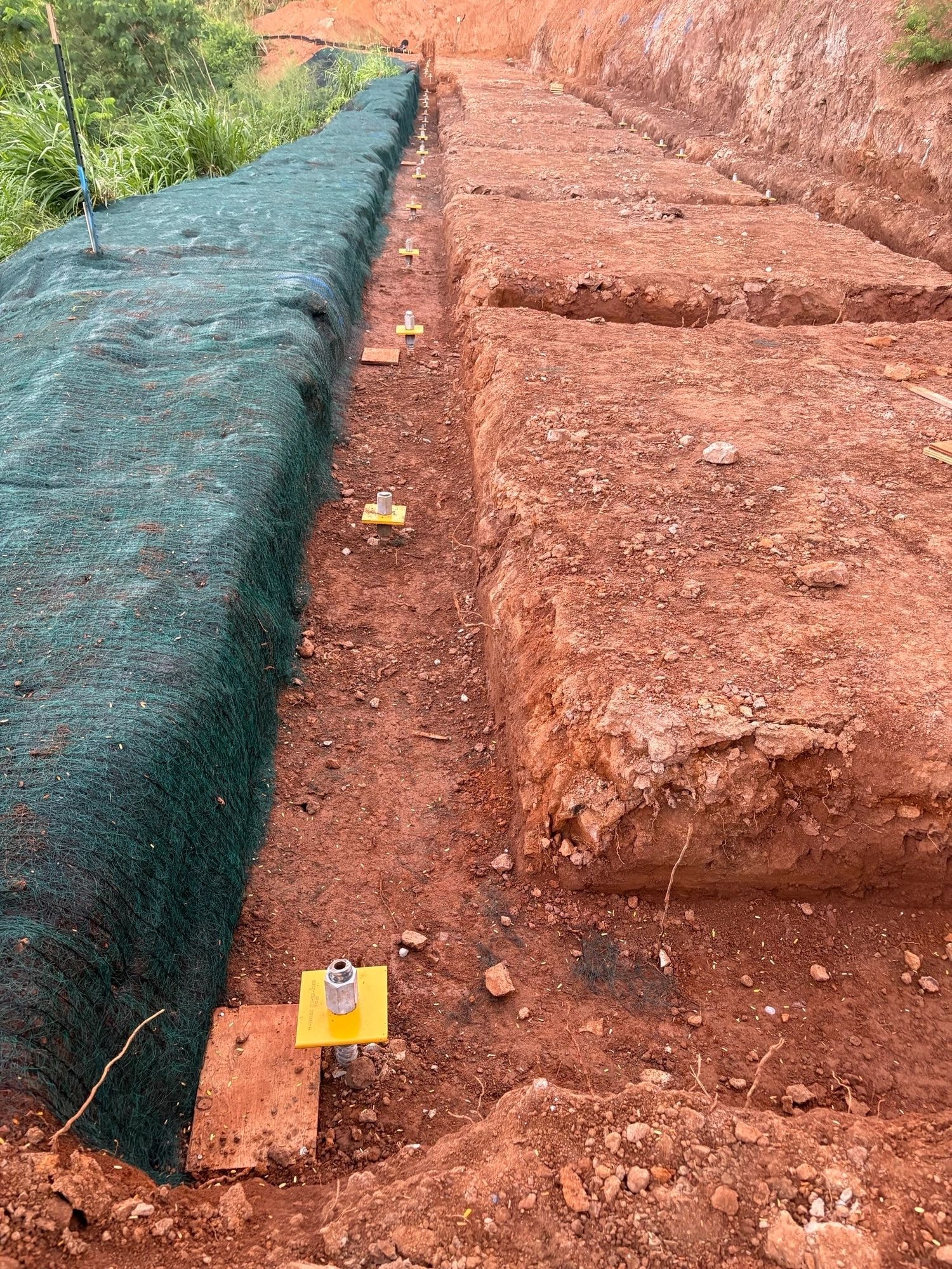 SSH crew working on a wrapped embankment construction site