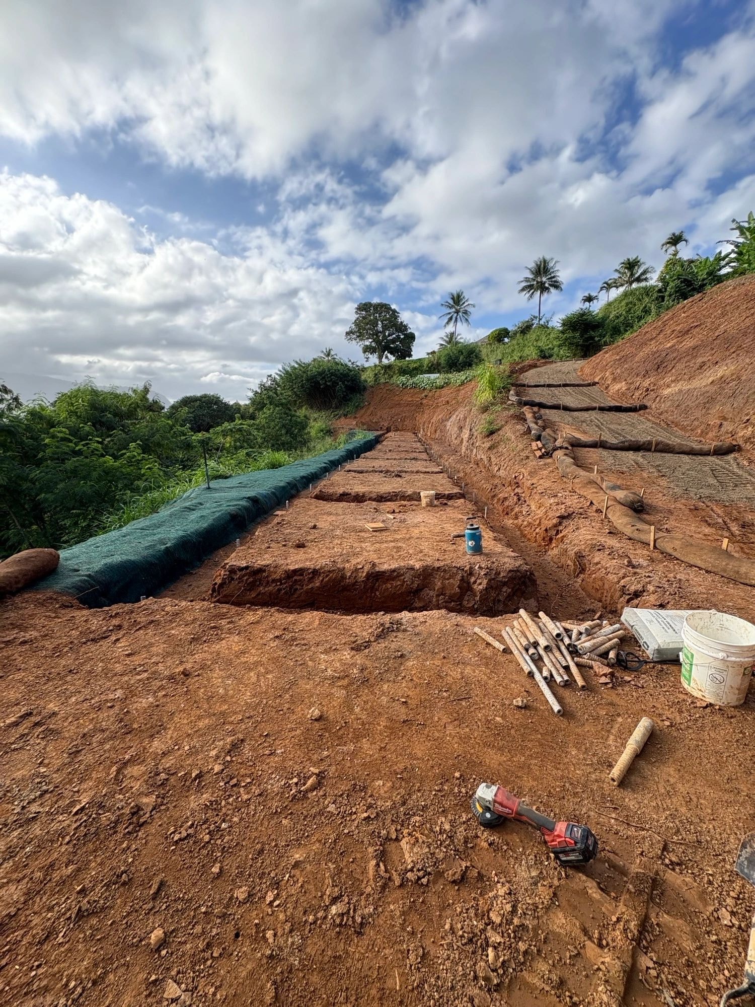 SSH construction crew working on a hillside project